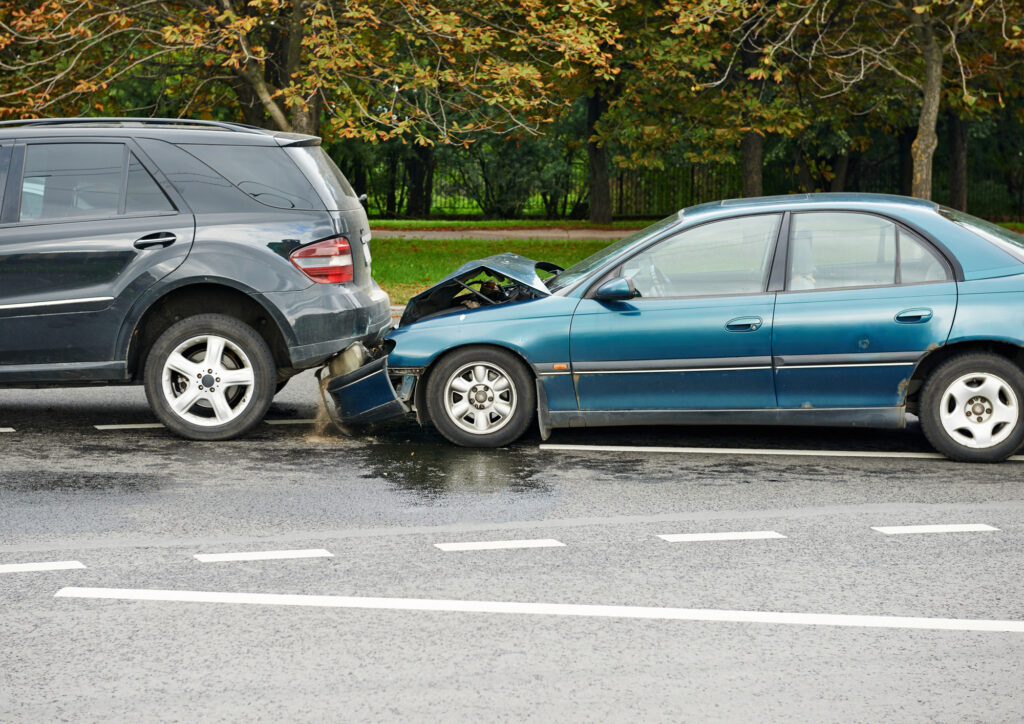 Car accident scene showing two damaged vehicles.
